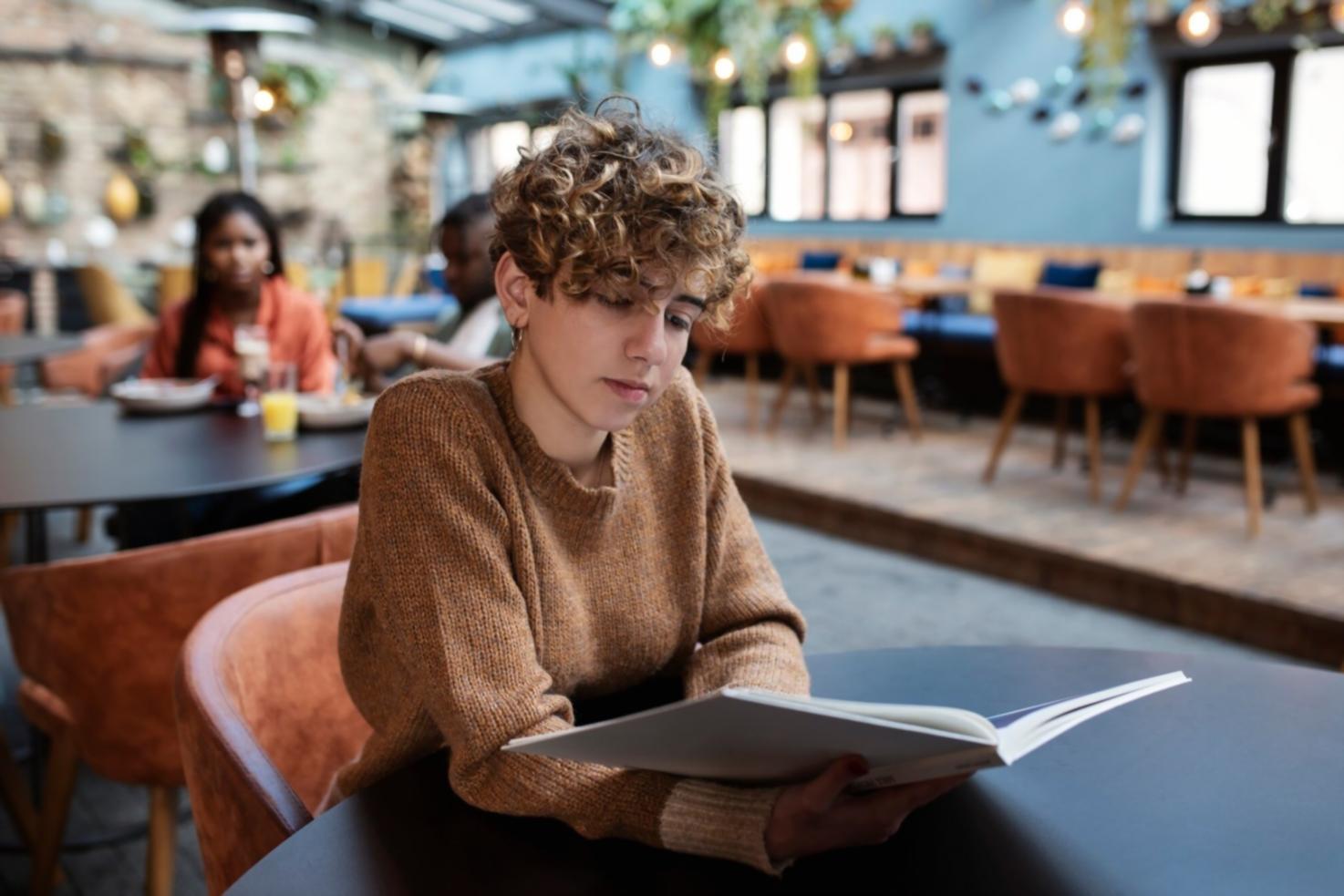 Professional analyzing complex financial data on multiple monitors